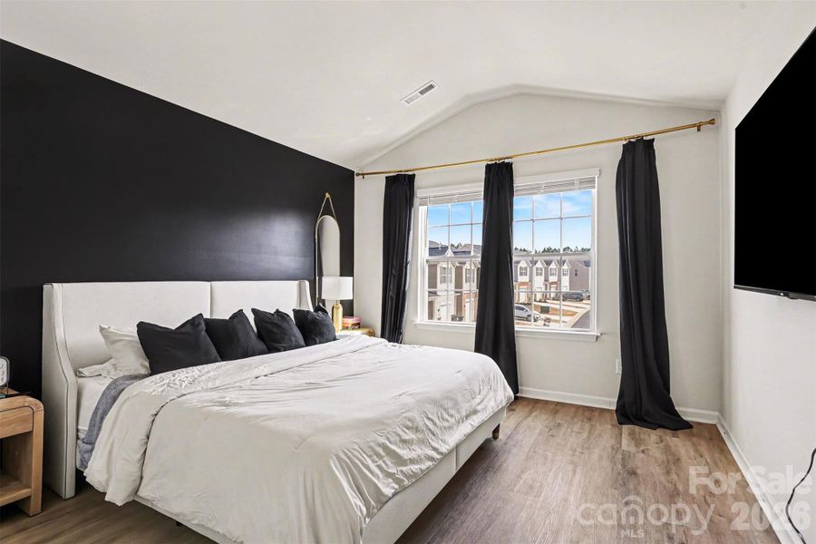 Another view of Primary Bedroom showing the light coming in.