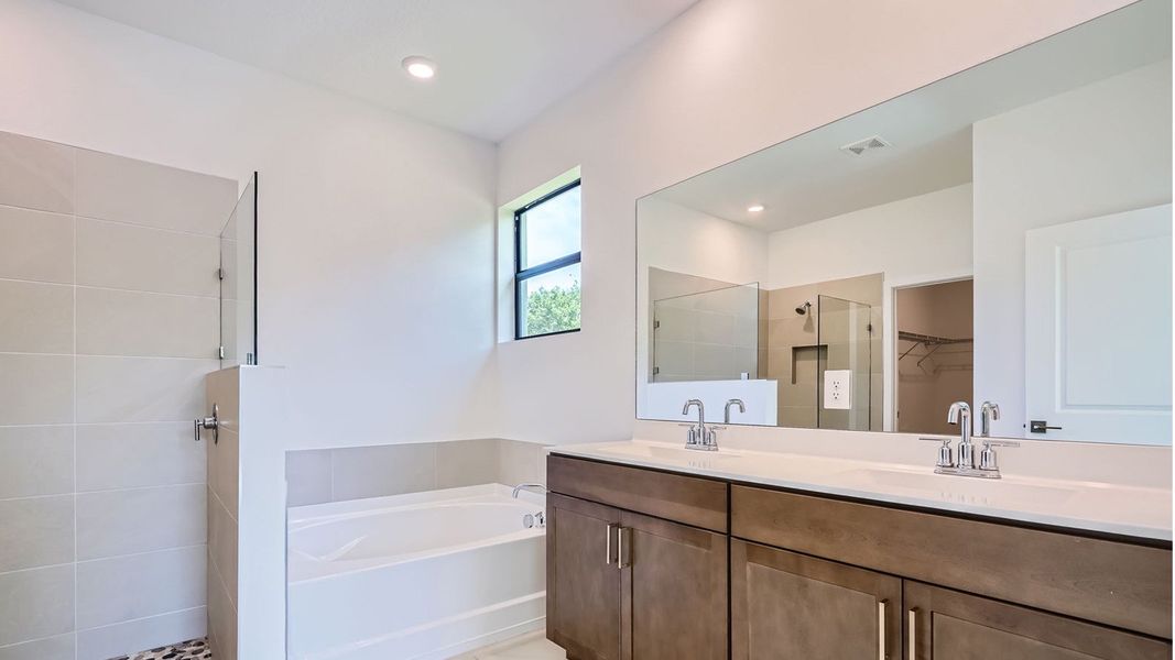 Representative furnished interior of a home built from the Cali by D.R. Horton in Twin Oaks, Stuart (Image 8).