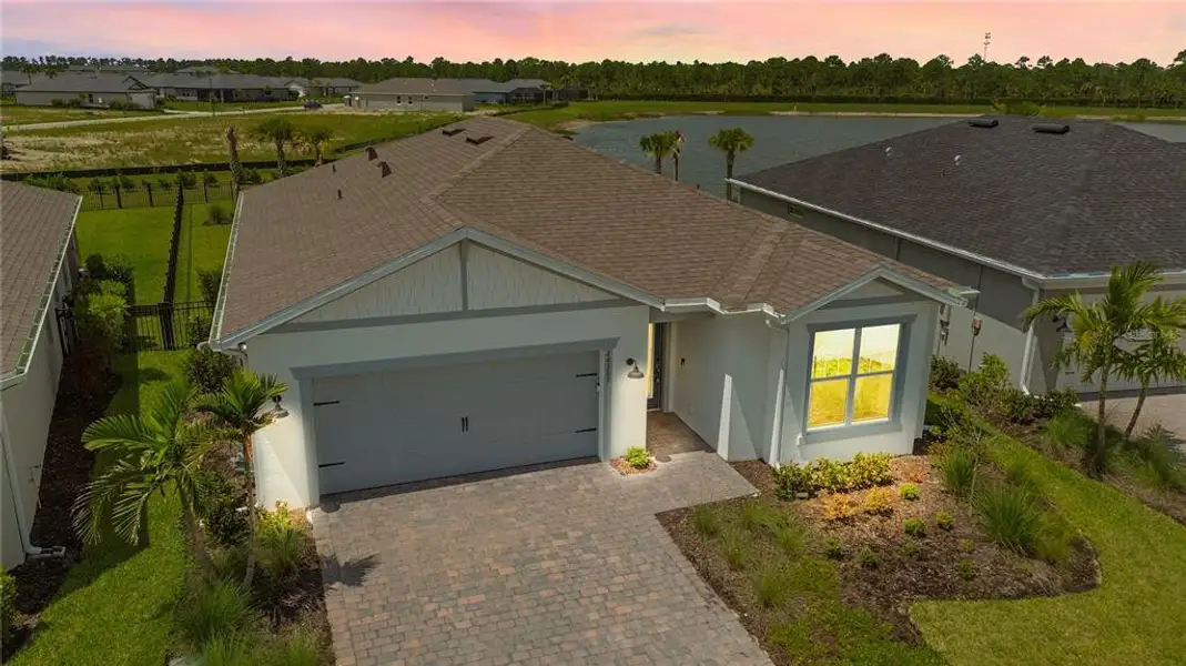 Front exterior of a new home in , Punta Gorda, FL, highlighting curb appeal (Image 1). Front exterior of a new home in , Punta Gorda, FL, highlighting curb appeal (Image 1).