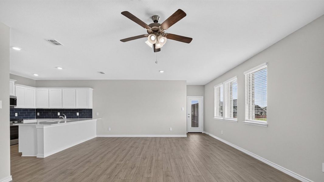Representative unfurnished interior of a home built from the Rosemary by D.R. Horton in Lilybrooke at Legacy Hills, Celina (Image 10).