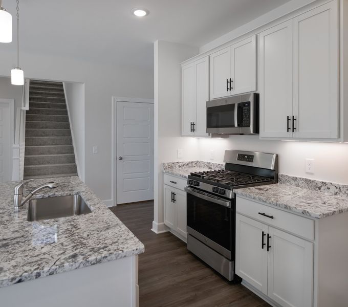 Representative furnished interior of a home built from the The Ivory by Cothran Homes in Holly Ridge, Greenville (Image 5).