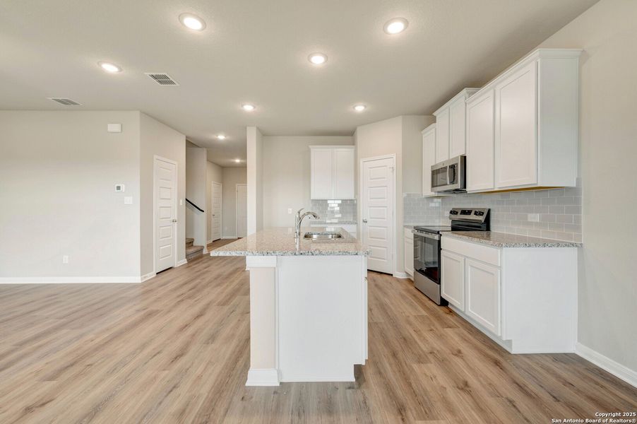 Furnished interior view inside a new home in Paloma Park, Converse (Image 8).