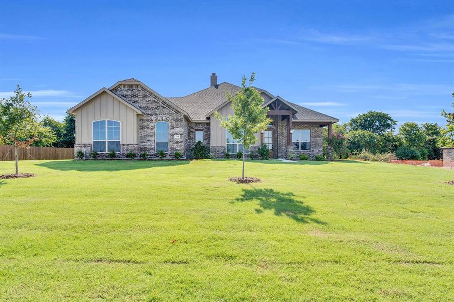 Front exterior of a new home in , Red Oak, TX, highlighting curb appeal (Image 25). Front exterior of a new home in , Red Oak, TX, highlighting curb appeal (Image 25).
