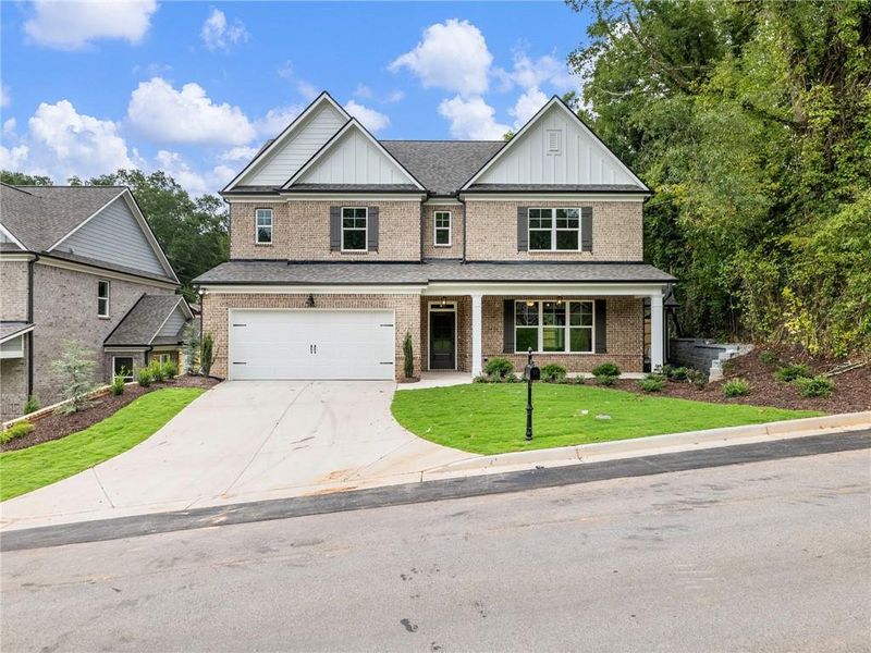 Front exterior of a new home in , Buford, GA, highlighting curb appeal (Image 26). Front exterior of a new home in , Buford, GA, highlighting curb appeal (Image 26).
