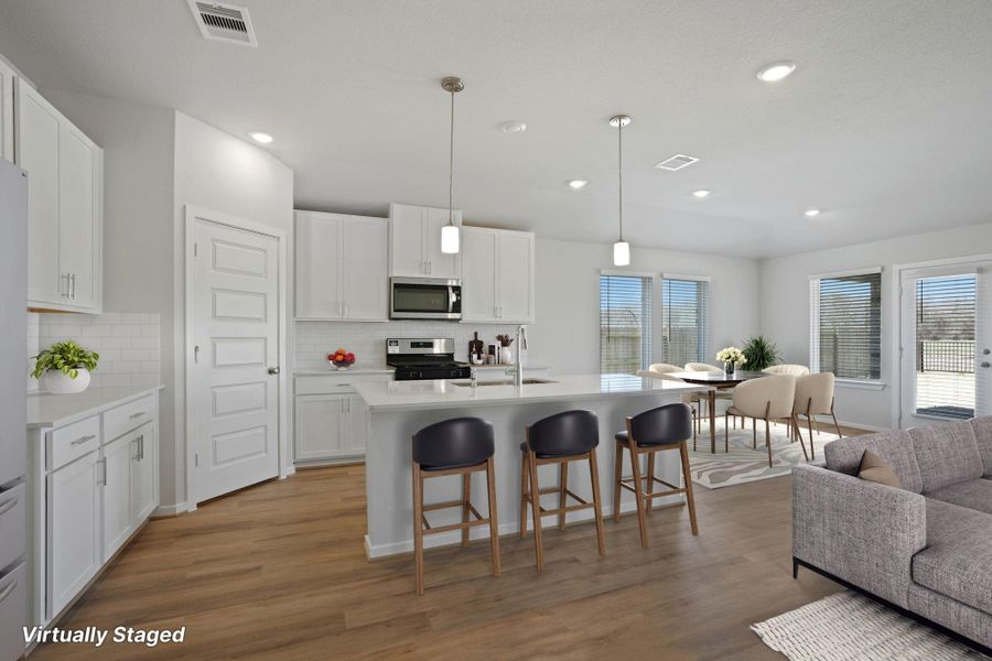 Furnished interior view inside a new home in Pine Lake Cove - Classic Series, Montgomery (Image 3).