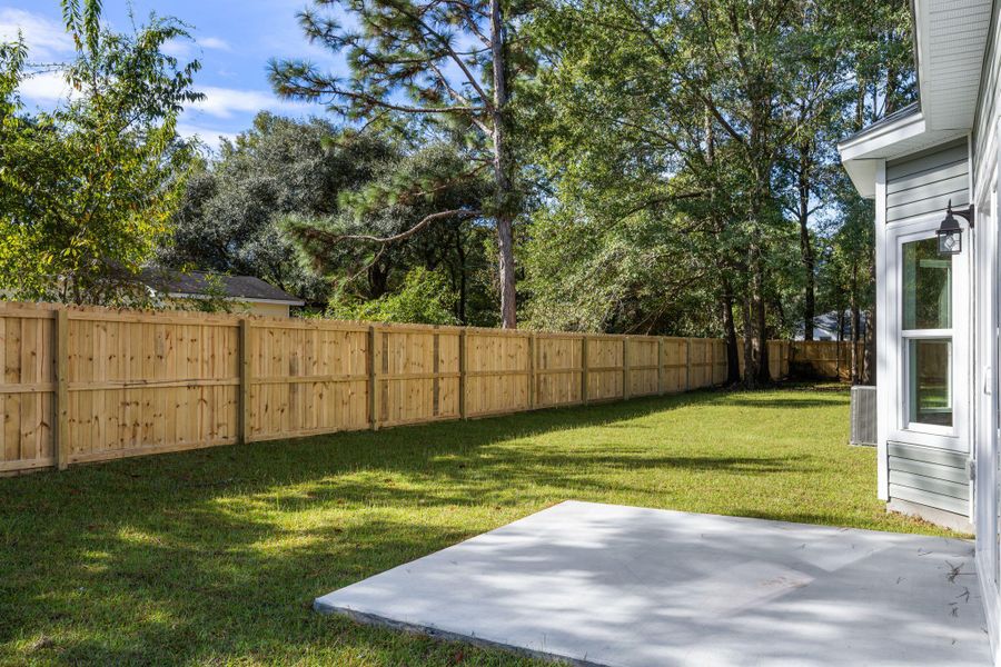 Exterior details and patio area of a home in , Johns Island (Image 17). Exterior details and patio area of a home in , Johns Island (Image 17).