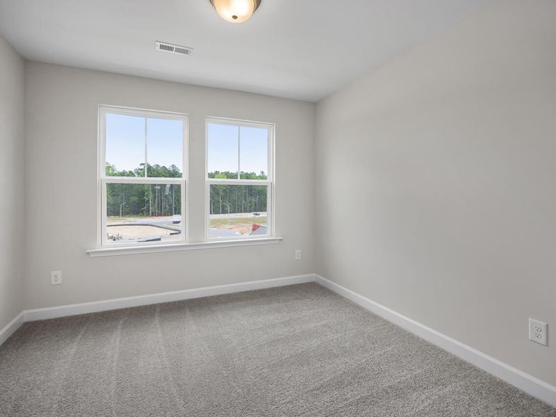 Spacious, unfurnished interior of a new home in Forestville Yard Townhomes, Knightdale (Image 20).