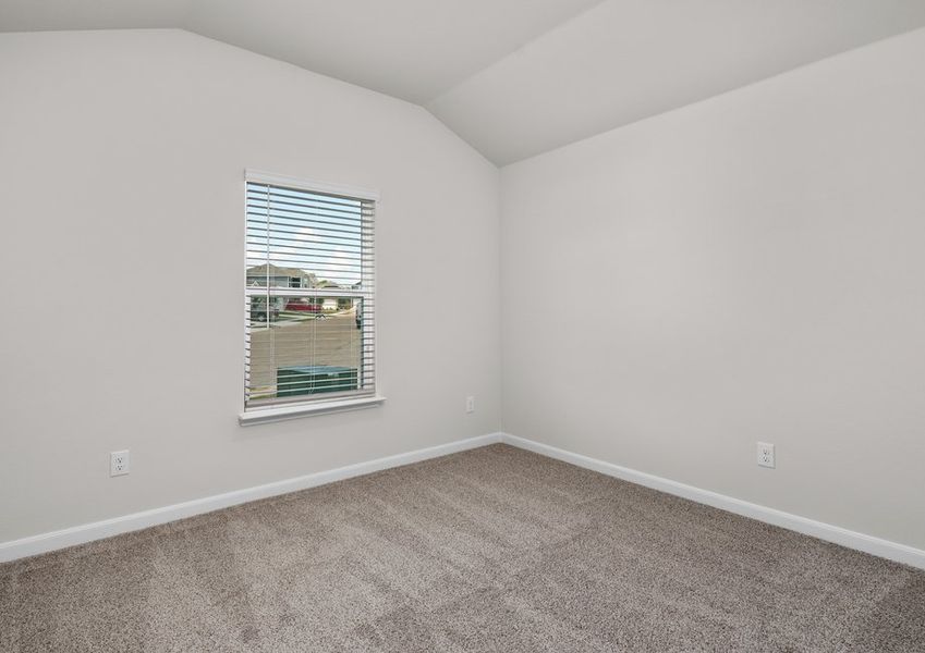 The secondary bedroom is spacious and has a large window. The secondary bedroom is spacious and has a large window.