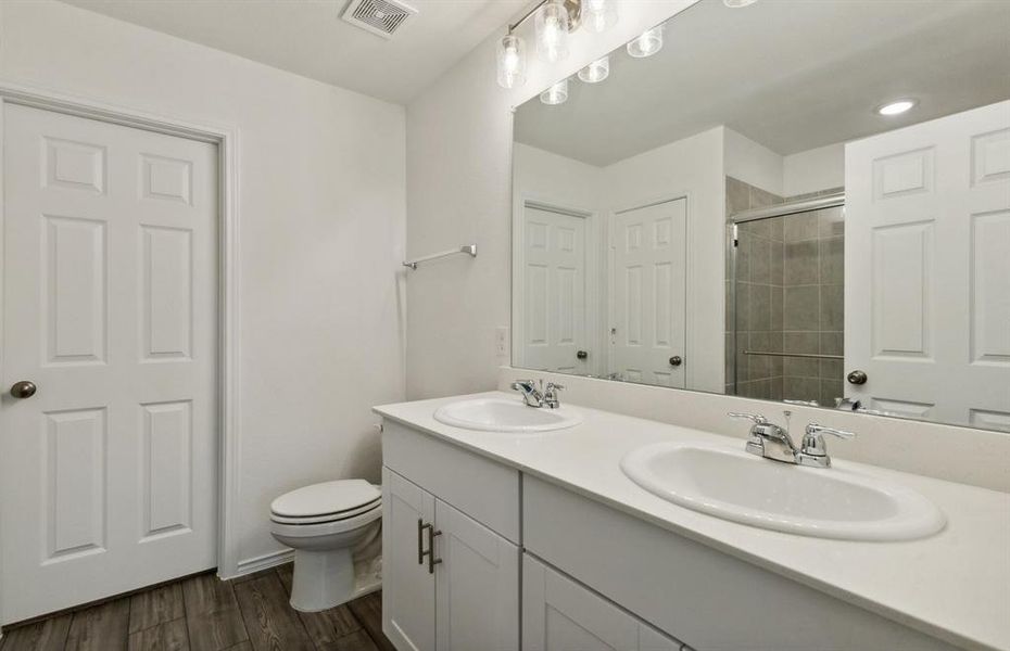 Upgraded secondary bathroom*real home pictured