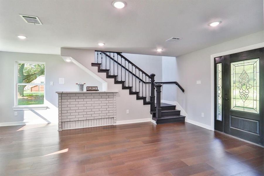 A Perfect Lifestyle Property To Treasure. Attractive front door entrance with glass panels; recessed canned lights and brick accent wall.