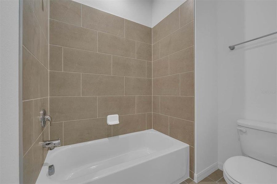 Furnished interior view inside a new home in Brack Ranch, St. Cloud (Image 23).