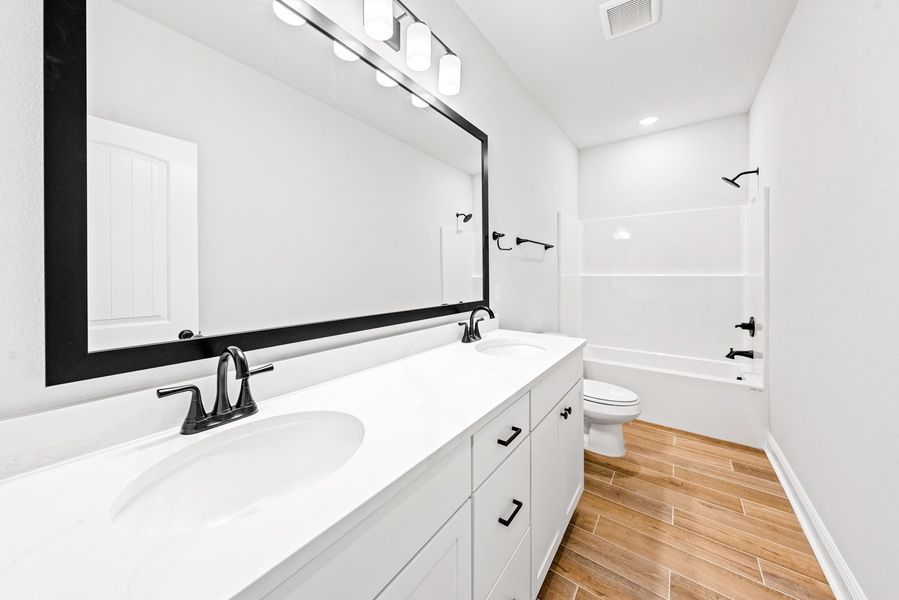 Furnished interior view inside a new home in Natureview, Freeport (Image 8).