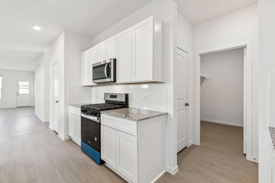 Furnished interior view inside a new home in Montgomery Bend, Montgomery (Image 6).