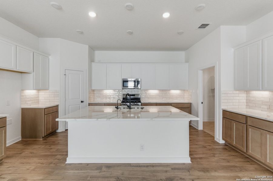 Furnished interior view inside a new home in The Crossvine – Garden Homes, Schertz (Image 9).