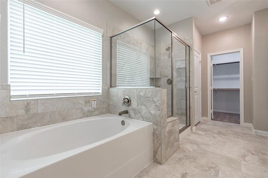 Separate soaking tub and shower