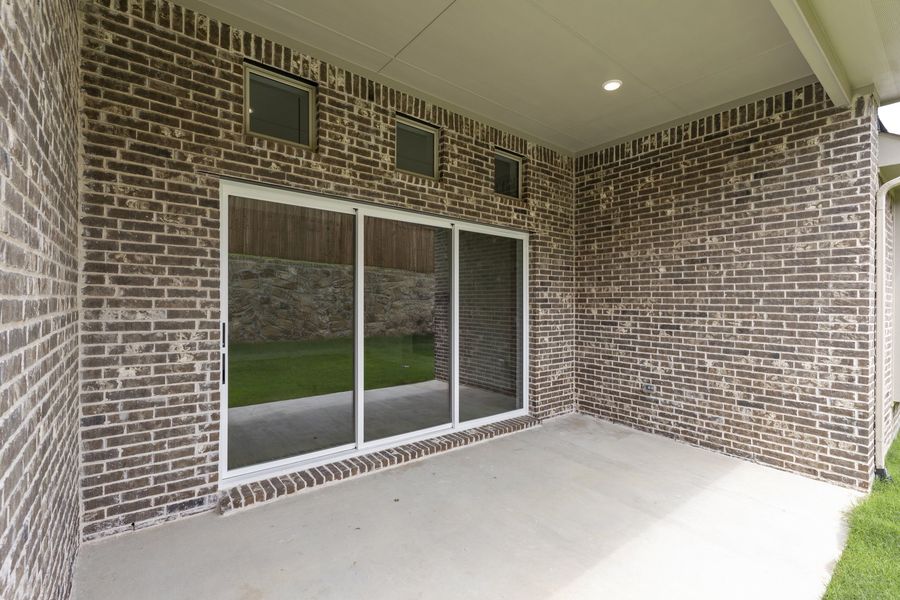 Exterior details and patio area of a home in Park Hills, Rockwall (Image 3). Exterior details and patio area of a home in Park Hills, Rockwall (Image 3).