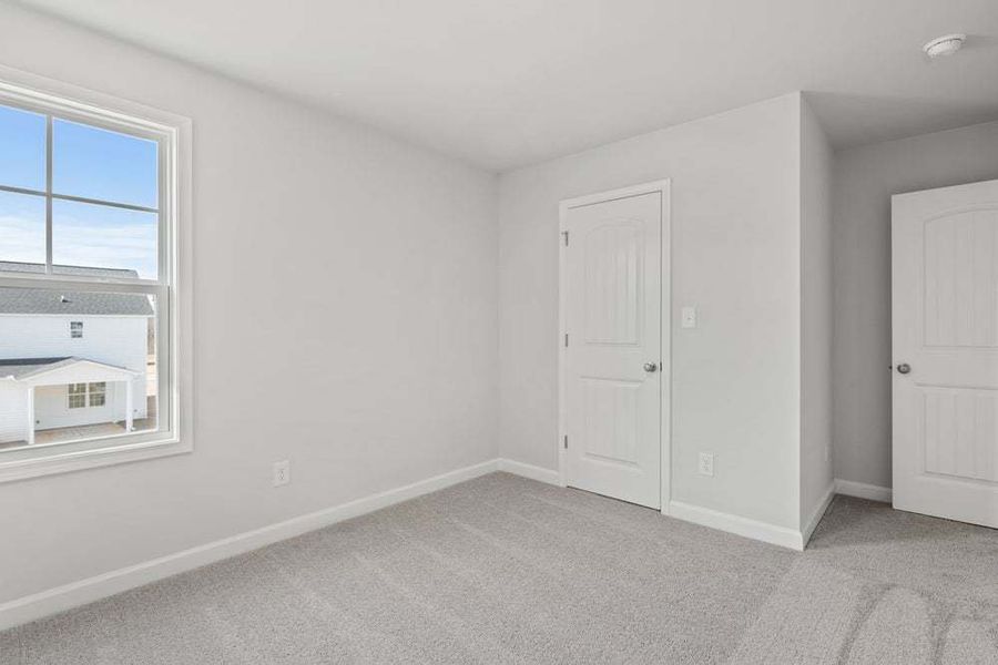 Representative unfurnished interior of a home built from the Camellia by Caviness & Cates Communities in Bartlett Manor, Youngsville (Image 55).