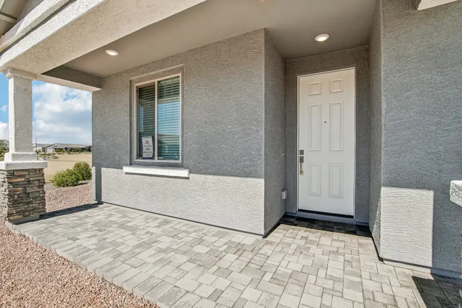 Front porch and covered entry. Finishes and options may vary by community.