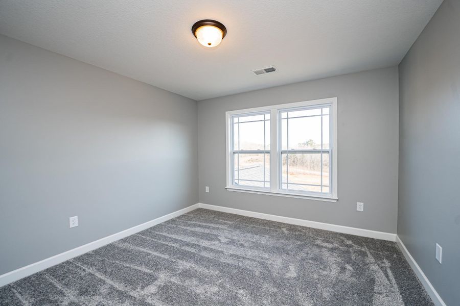 Representative unfurnished interior of a home built from the Sumter by Enchanted Homes in Lonesome Dove, San Antonio (Image 46).