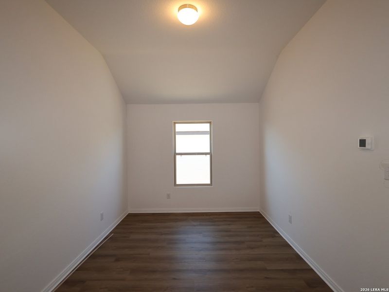 Spacious, unfurnished interior of a new home in Hunters Ranch, San Antonio (Image 18).