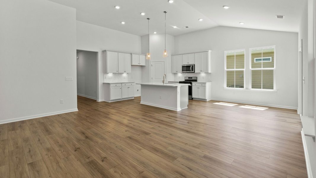 Furnished interior view inside a new home in Bluffs at Sun Colony, Longs (Image 8).