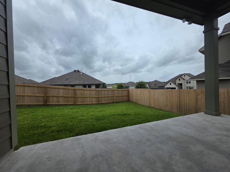 Exterior details and patio area of a home in Vintage Farms, Brenham (Image 3). Exterior details and patio area of a home in Vintage Farms, Brenham (Image 3).
