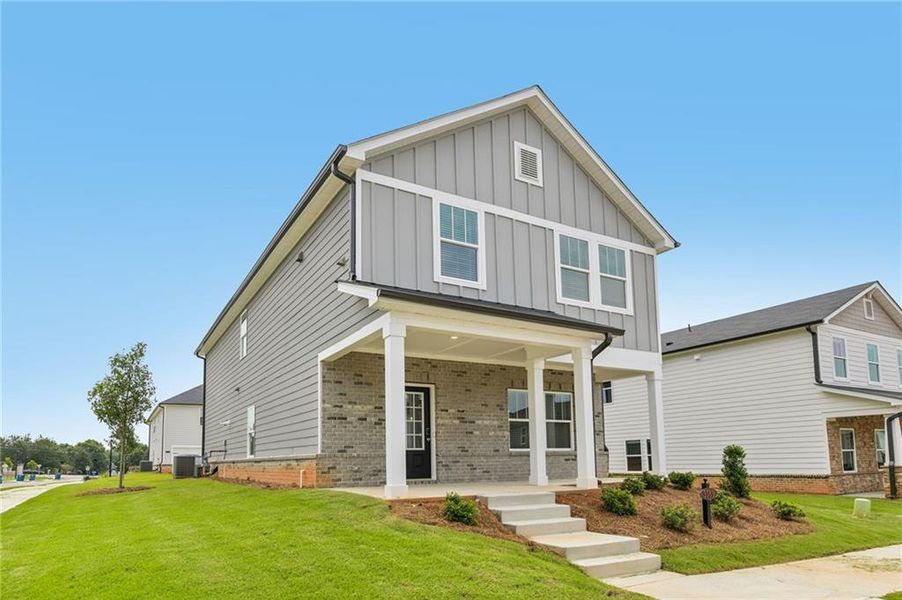 Front exterior of a new home in , Lawrenceville, GA, highlighting curb appeal (Image 24). Front exterior of a new home in , Lawrenceville, GA, highlighting curb appeal (Image 24).
