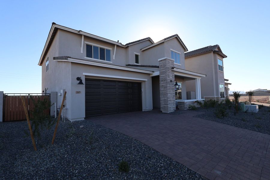 Front exterior of a new home in Tavolo at Soleo, San Tan Valley, AZ, highlighting curb appeal (Image 2). Front exterior of a new home in Tavolo at Soleo, San Tan Valley, AZ, highlighting curb appeal (Image 2).