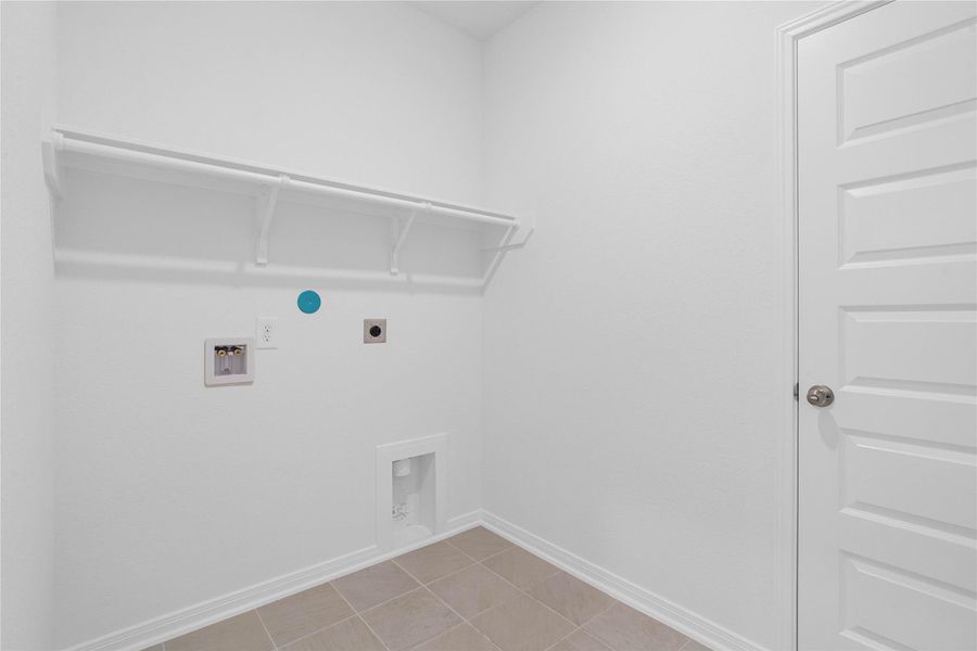 Move-in ready laundry nook featuring built-in storage and space for your own washer and dryer. Move-in ready laundry nook featuring built-in storage and space for your own washer and dryer.