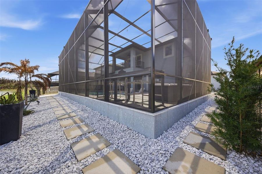 Exterior details and patio area of a home in Whispering Oaks Preserve, Wesley Chapel (Image 41). Exterior details and patio area of a home in Whispering Oaks Preserve, Wesley Chapel (Image 41).