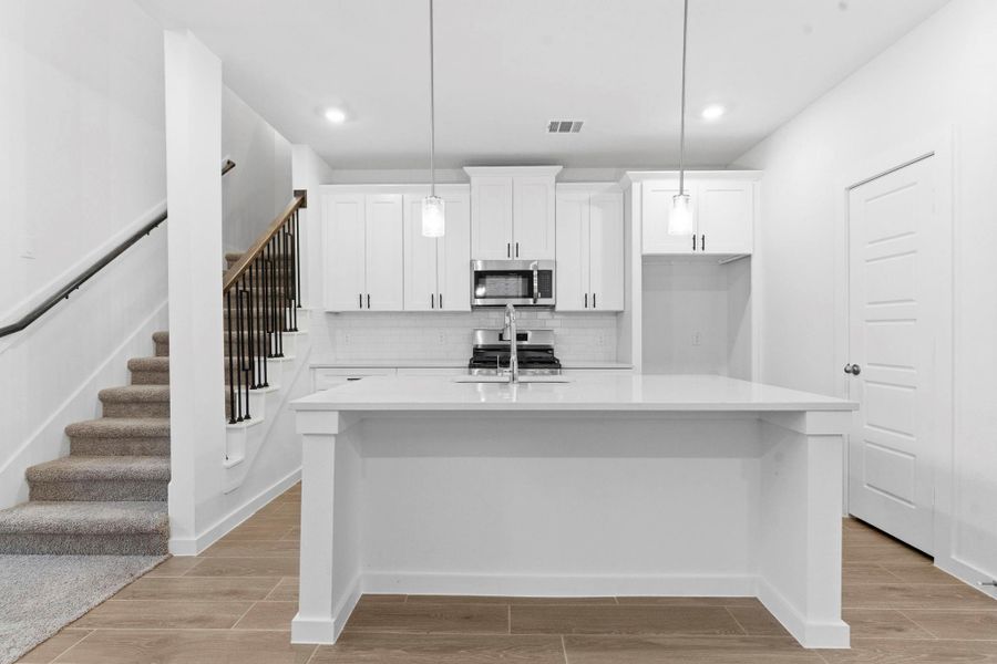 Furnished interior view inside a new home in , Iowa Colony (Image 9).