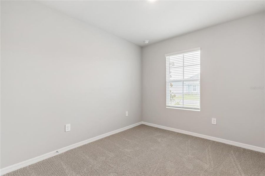 Spacious, unfurnished interior of a new home in Heritage Lake Park, Punta Gorda (Image 17).