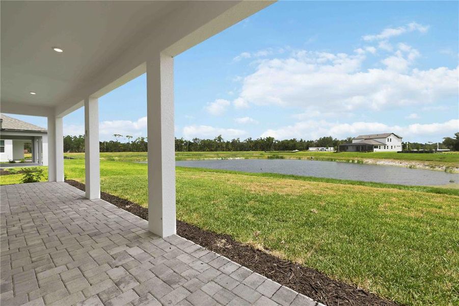 Exterior details and patio area of a home in Creeks Edge at Twin Rivers, Parrish (Image 4).