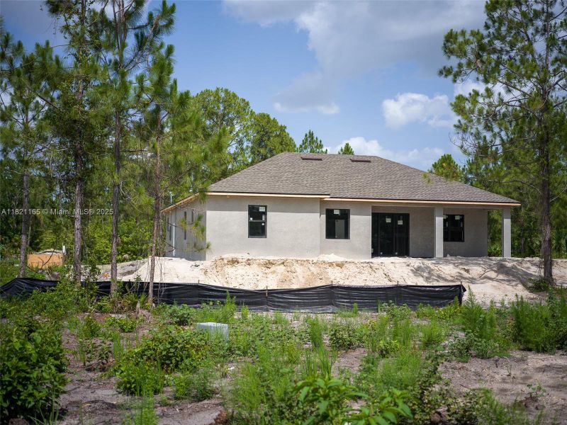 Exterior details and patio area of a home in , Lehigh Acres (Image 3).