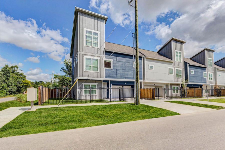 A fresh architectural take in a growing Houston neighborhood! Enjoy being the first to live in this new construction beauty with a private yard, gated entry, and bold vertical lines that make a statement. A fresh architectural take in a growing Houston neighborhood! Enjoy being the first to live in this new construction beauty with a private yard, gated entry, and bold vertical lines that make a statement.
