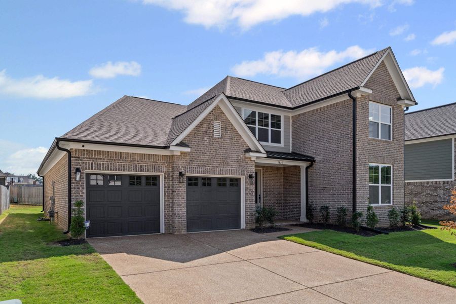 Front exterior of a new home in White Oak, Arlington, TN, highlighting curb appeal (Image 2). Front exterior of a new home in White Oak, Arlington, TN, highlighting curb appeal (Image 2).