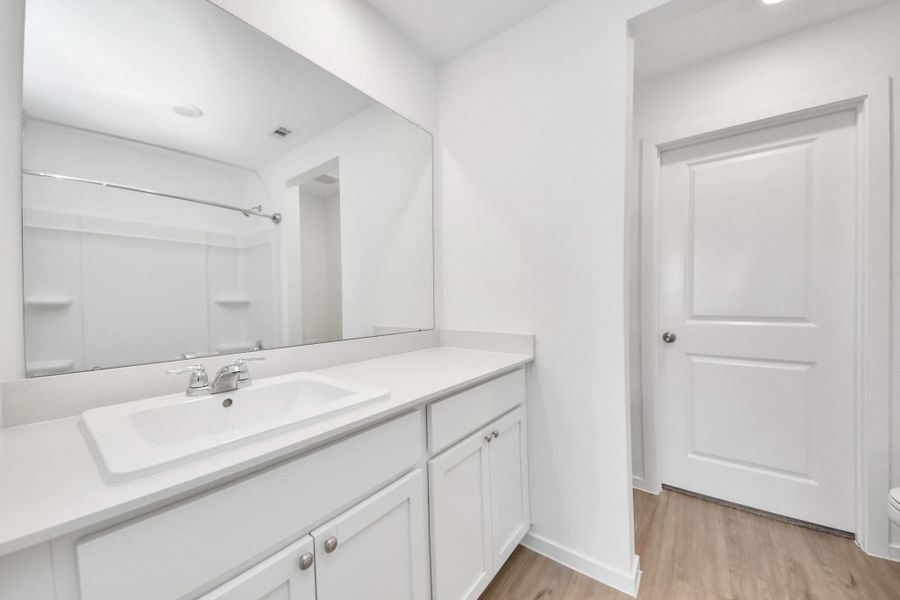 Spacious vanity with plenty of storage.