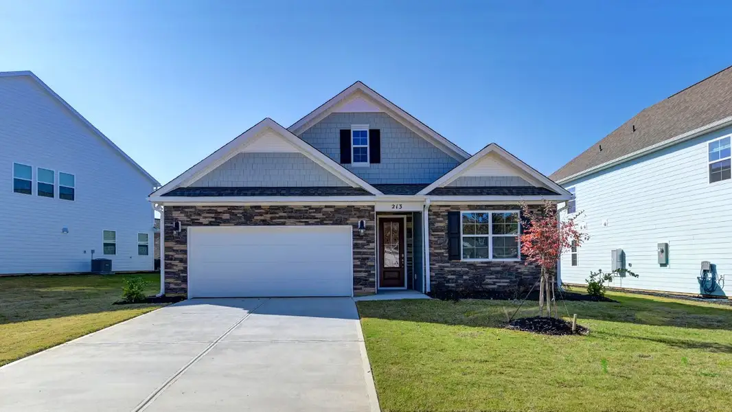Front exterior of a new home in Livingston Woods, Irmo, SC, highlighting curb appeal (Image 2).