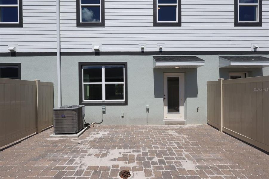 Exterior details and patio area of a home in Center Lake on the Park, St. Cloud (Image 13).
