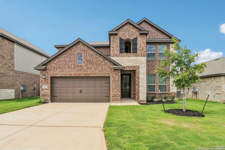 Front exterior of a new home in Fox Falls, Boerne, TX, highlighting curb appeal (Image 31).
