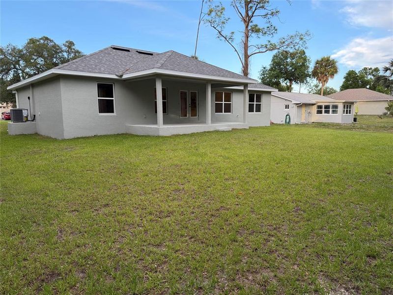 Exterior details and patio area of a home in Port Charlotte, Port Charlotte (Image 16).