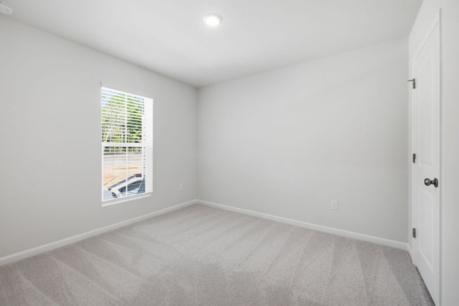 Spacious, unfurnished interior of a new home in Carpenter Falls, Durham (Image 12).