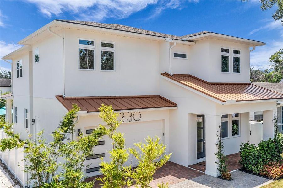 Front exterior of a new home in , Orlando, FL, highlighting curb appeal (Image 1). Front exterior of a new home in , Orlando, FL, highlighting curb appeal (Image 1).