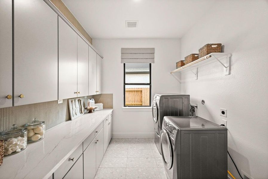 A large utility room for maximum functionality. Representative image.