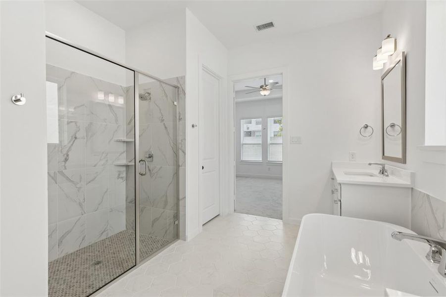 You'll enjoy soaking your cares away or indulging in a long, luxurious shower in this lovely owner's bath! You'll enjoy soaking your cares away or indulging in a long, luxurious shower in this lovely owner's bath!