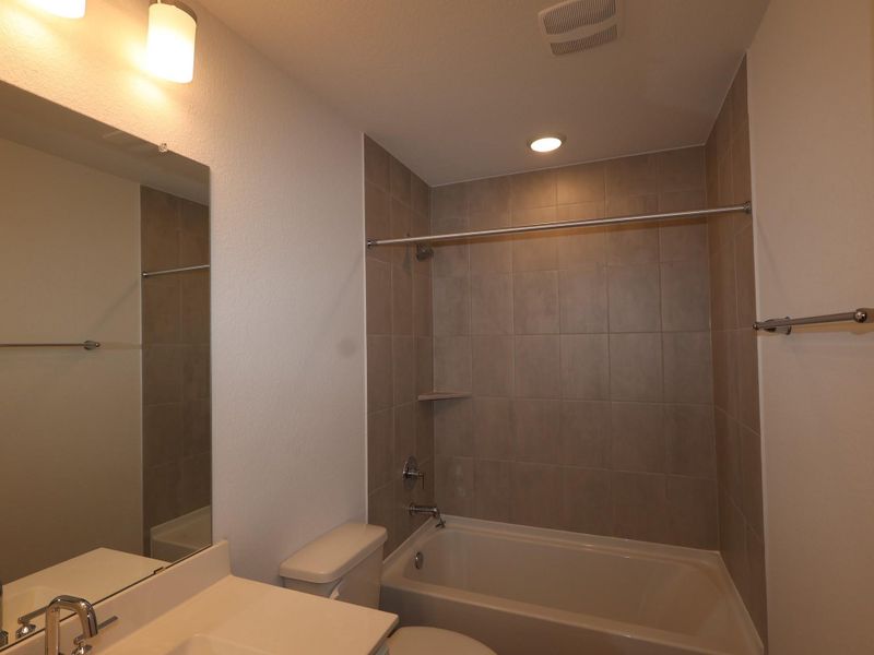 Furnished interior view inside a new home in Sorella, Tomball (Image 5).
