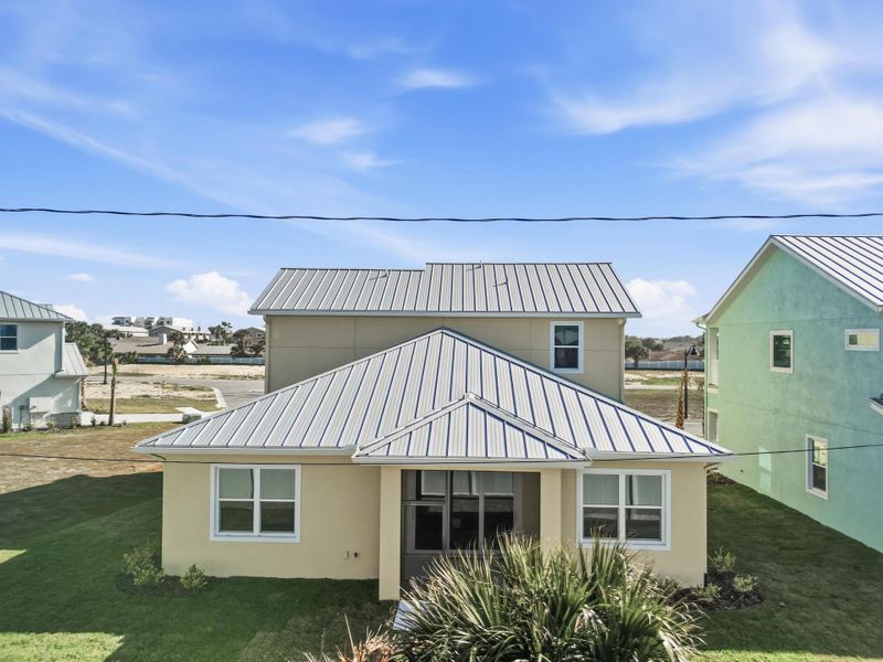 Exterior details and patio area of a home in Beachview Cove, Ormond Beach (Image 3).