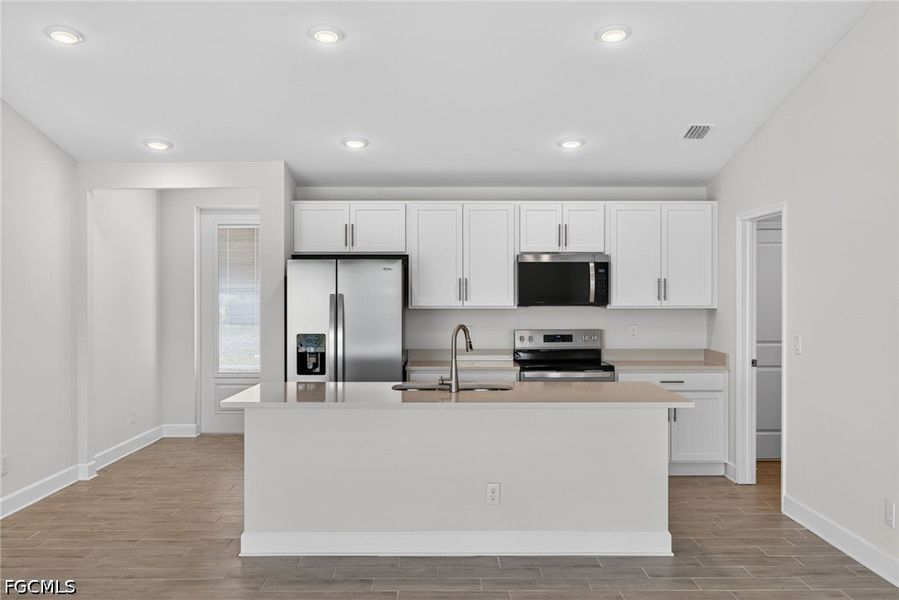 Furnished interior view inside a new home in Cape Coral, Cape Coral (Image 10).