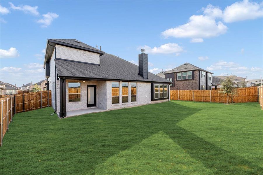 Exterior details and patio area of a home in West Crossing, Anna (Image 28). Exterior details and patio area of a home in West Crossing, Anna (Image 28).