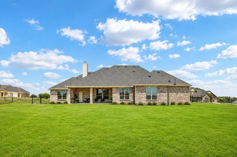 Exterior details and patio area of a home in , Waxahachie (Image 3).